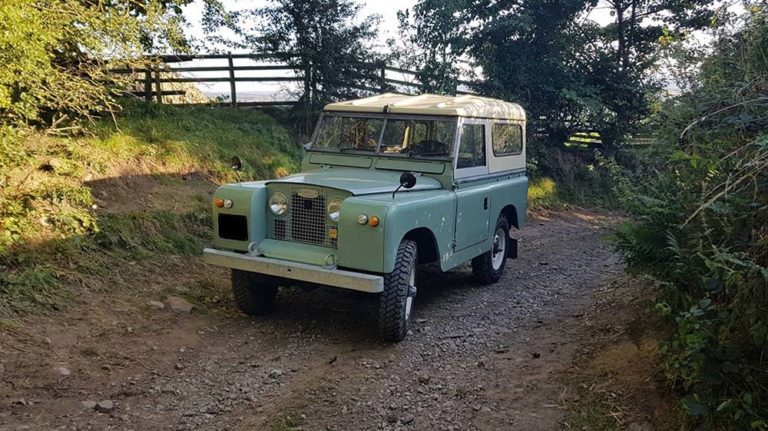 Tony's pale green Land Rover Series IIA on a dirt track