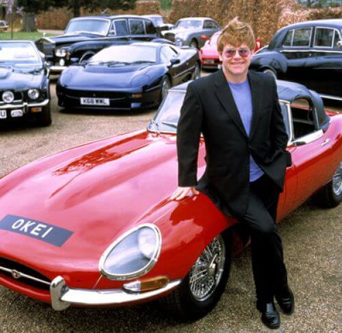 Elton John with his personalised, black and silver plated Jag, OKE1