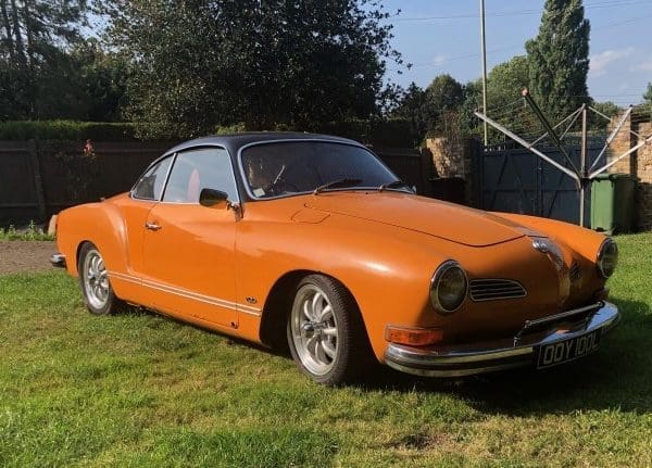 Orange Karmann Ghia in the sun