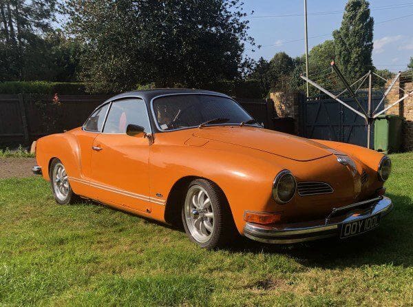 Orange Karmann Ghia in the sun