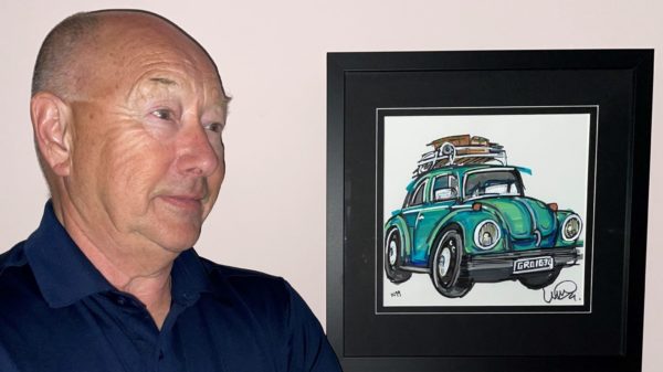 Heritage customer Kerry Davies with his VW Super Beetle drawing by Ian Cook