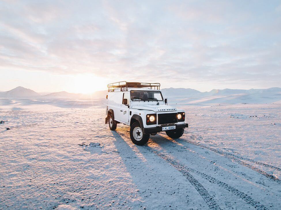 Land Rover Defender in the snow - Land Rover Enthusiasts Guide