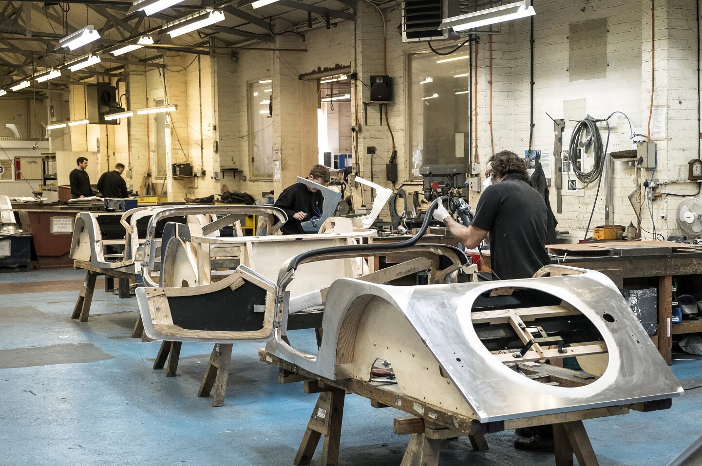 A wood-framed Morgan car being manufactured in their factory.